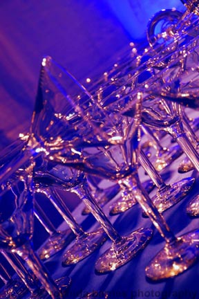 Long catered buffet line set in a bright event hall